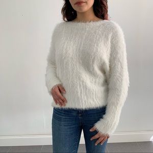 Wearing your heart on your sleeve white sweater